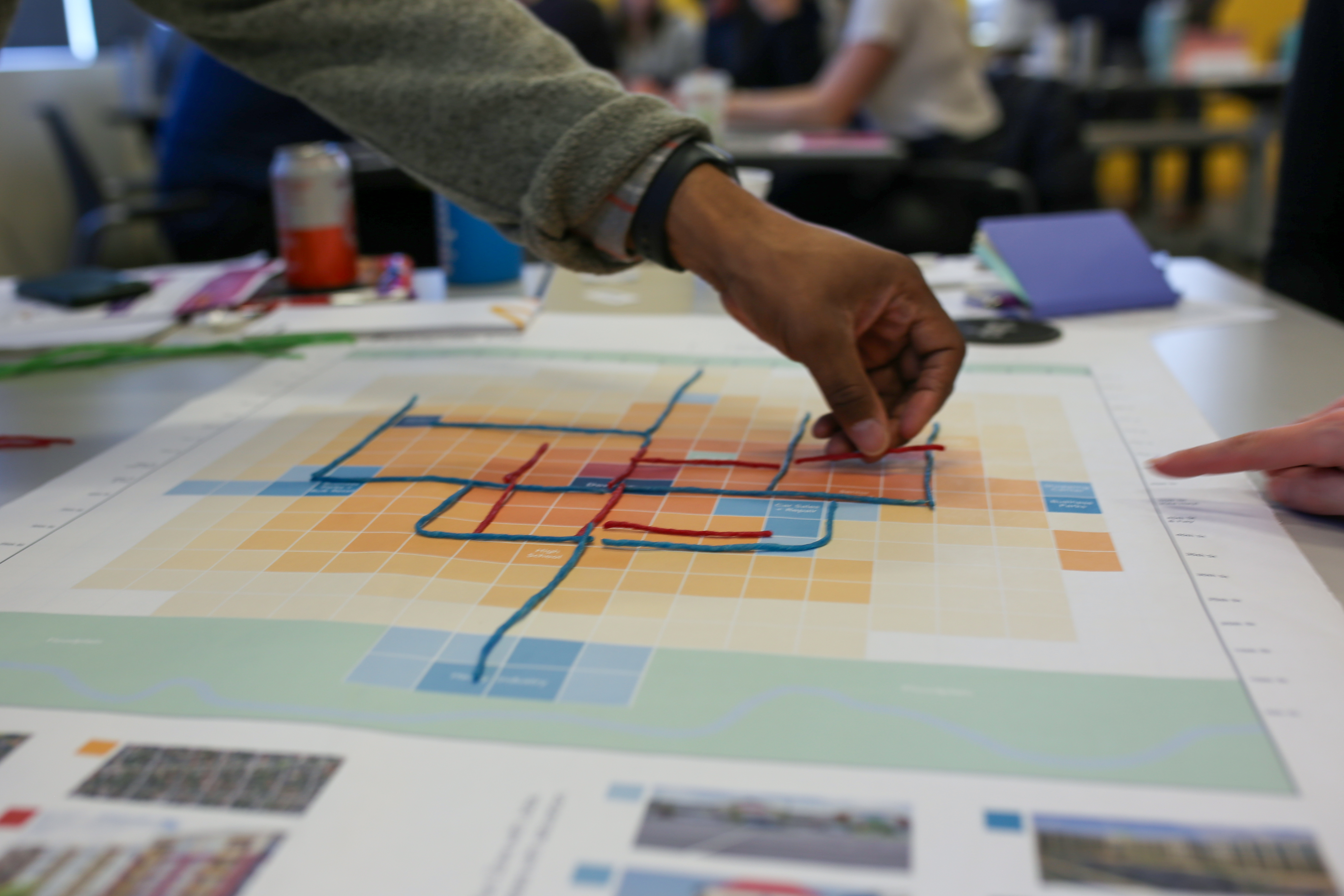 Image of DART staff and stakeholders designing a fictional transit system