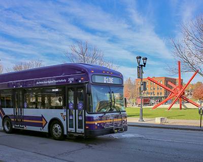 D-Line driving on Locust St. near Western Gateway Park