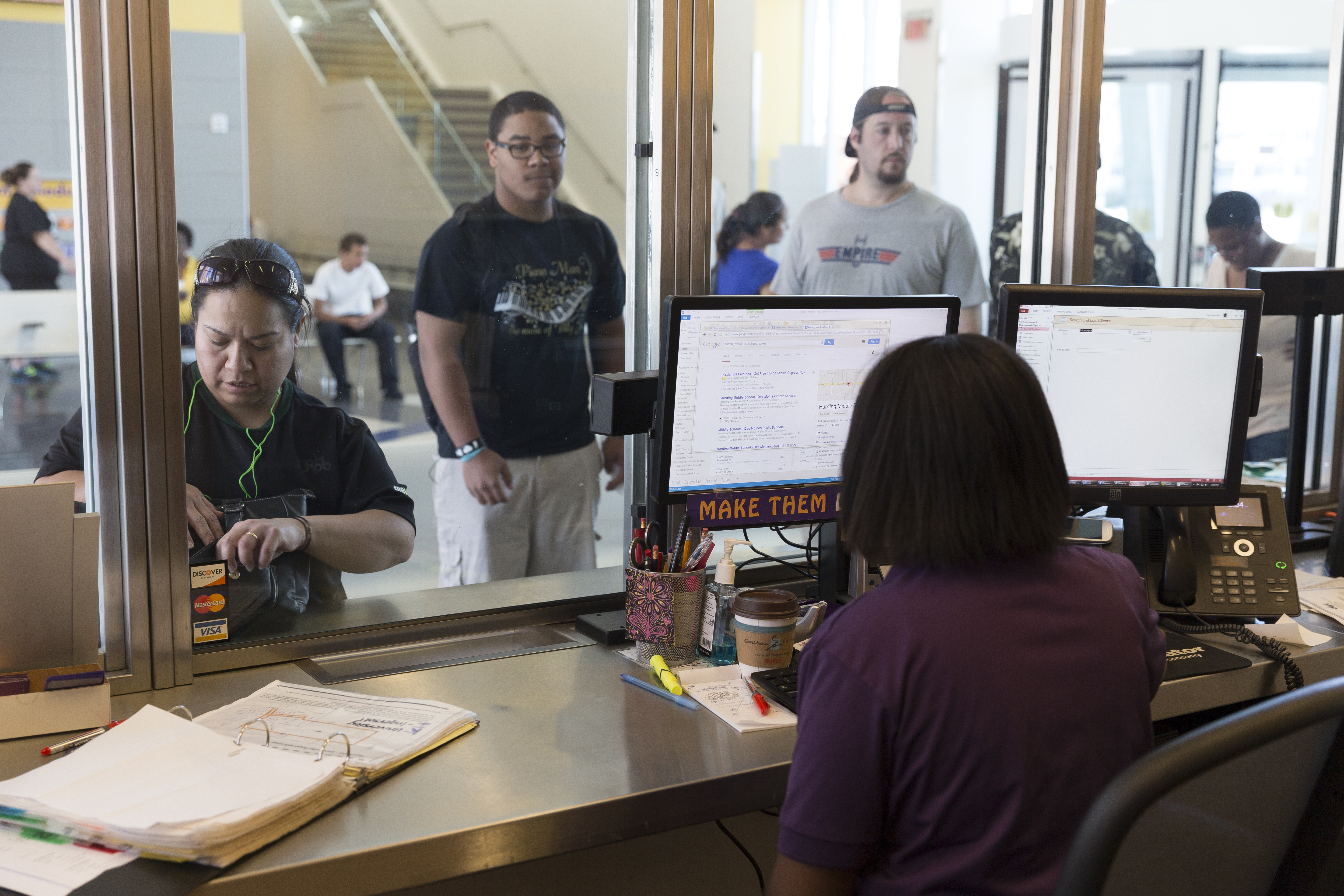 Photo of DART Customer Service representative providing information to riders